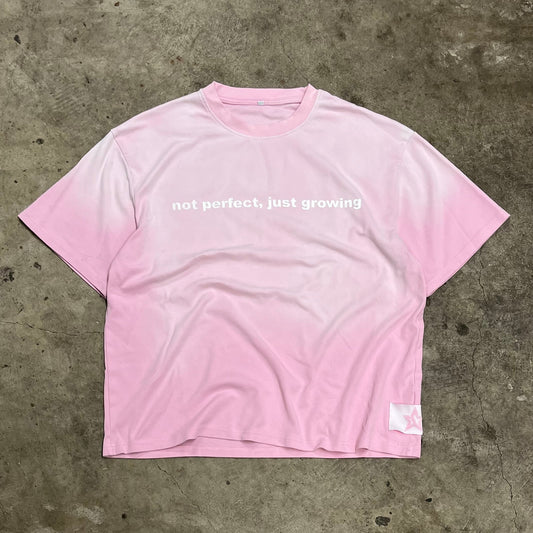 Pink “not perfect, just growing” Tee