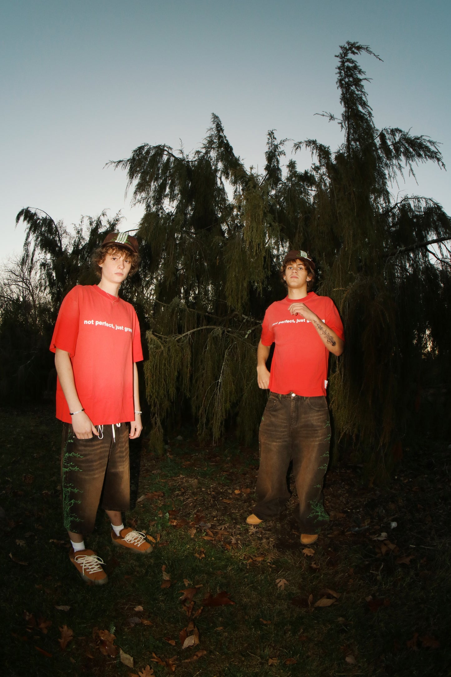 Red "not perfect, just growing" Tee